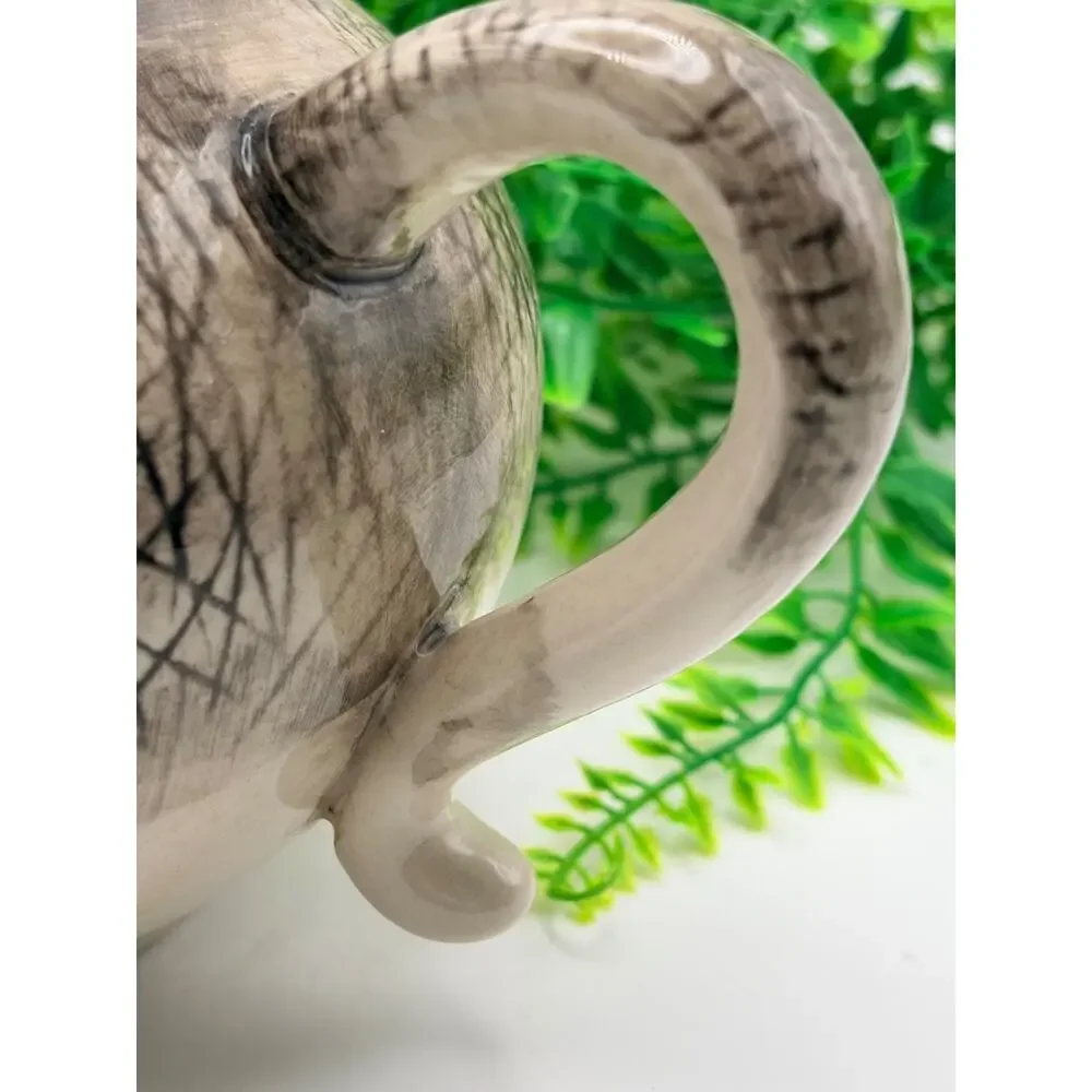 Vintage world market elephant tea pot.